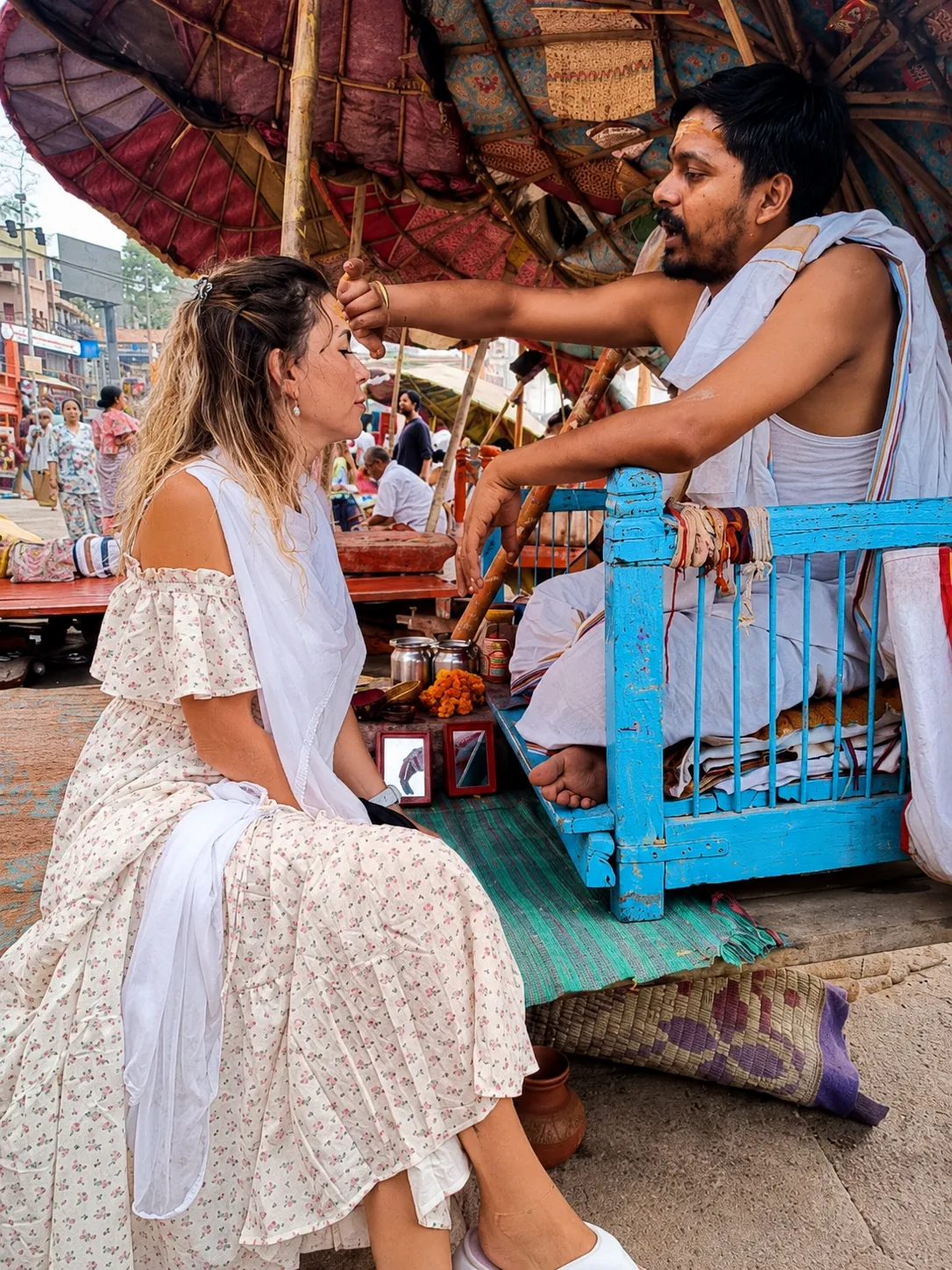 Guest receiving a traditional tilak blessing during a private Varanasi experience